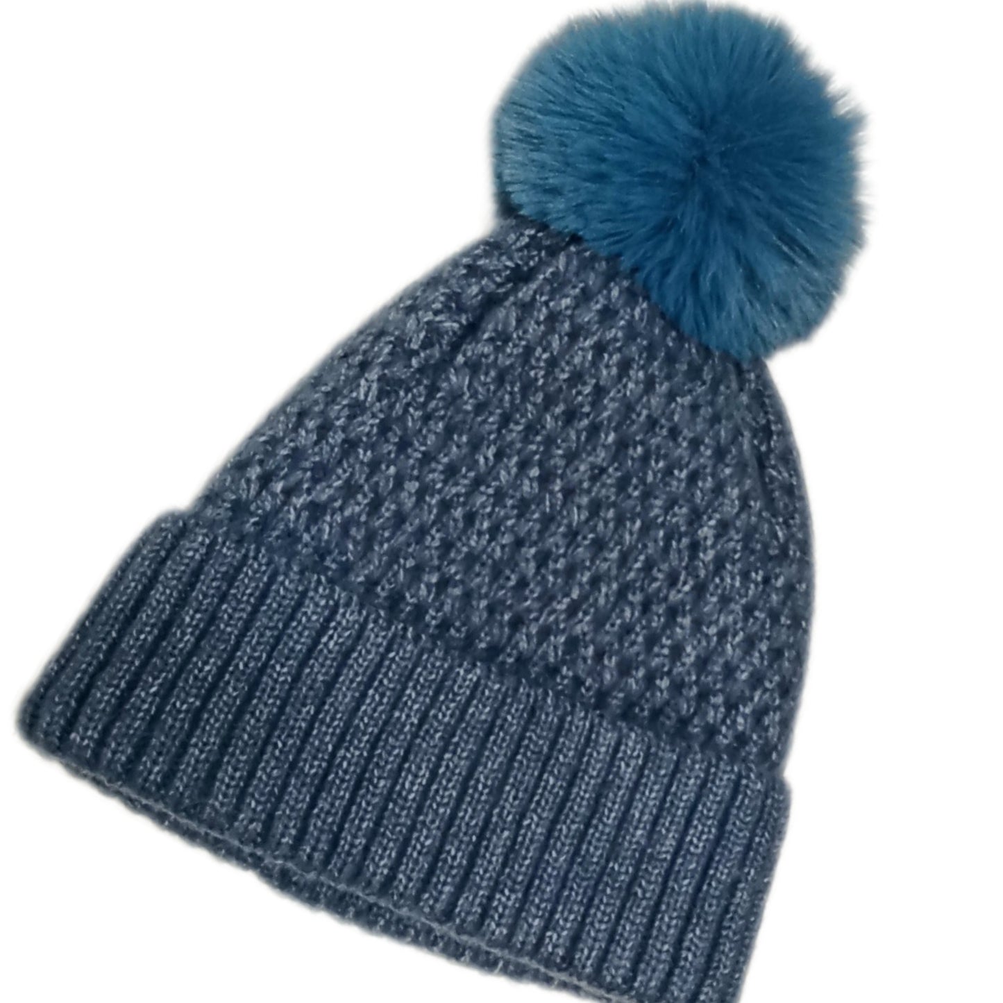 Schicke, gefütterte Bommel-Mütze mit schönem Muster in blau