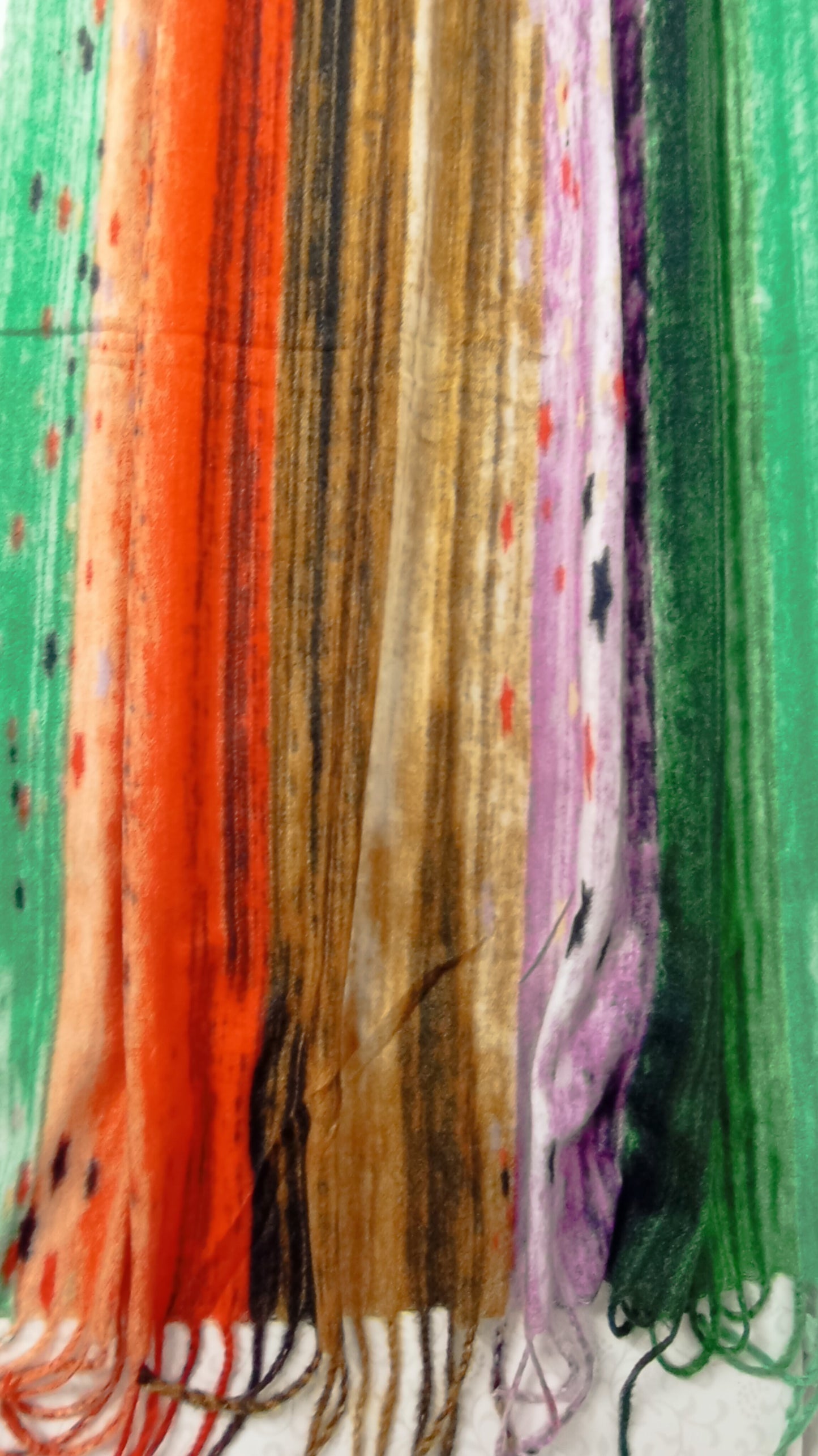 weicher Winterschal in bunt (grün, lila, braun und orange)
