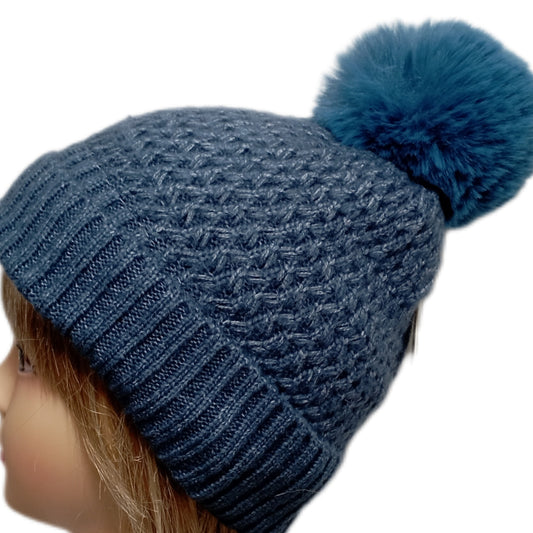Schicke, gefütterte Bommel-Mütze mit schönem Muster in blau